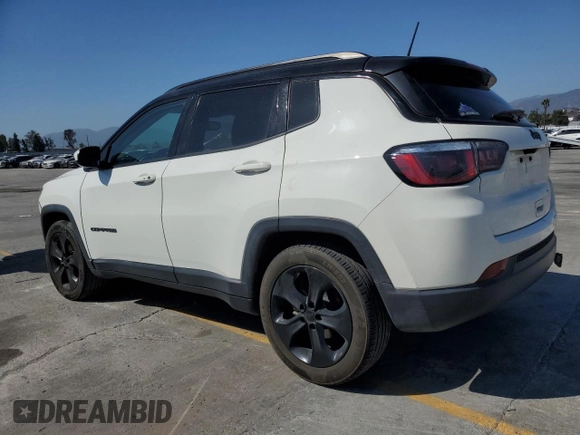 2019 Jeep Compass Altitude with VIN 3C4NJCBB4KT833213, listed as a Copart auction lot 57519955 with 82,738 mi miles and Salvage title. Bid and sale history available at DreamBid. Image 2.