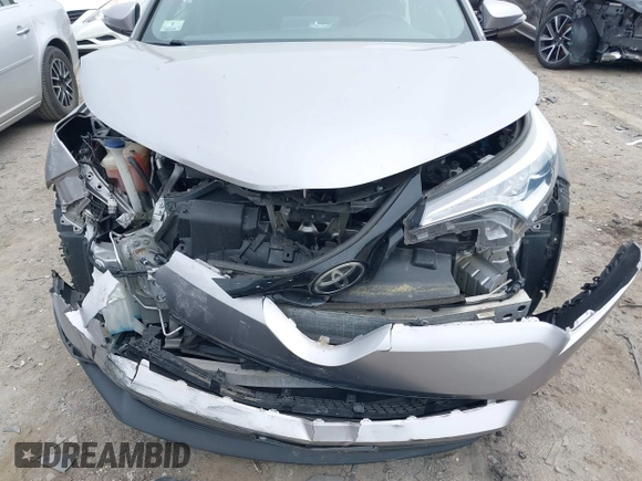 2018 Toyota C-HR XLE with VIN NMTKHMBX7JR014817, listed as a IAAI auction lot 42254183 with 128,561 mi miles and . Bid and sale history available at DreamBid. Image 6.