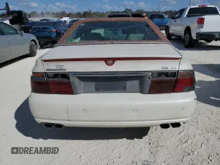 2003 Cadillac Seville Luxury SLS z VIN 1G6KS54Y03U289834, wystawiony jako Copart lot #77362694 z przebiegiem Nie podano mil oraz Szkoda całkowita • Salvage title. Historia ofert i sprzedaży dostępna na DreamBid. Obrazek 6.