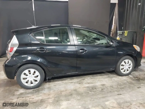 2012 Toyota Prius c One with VIN JTDKDTB31C1523466, listed as a IAAI auction lot 41828446 with 157,136 mi miles. Bid and sale history available at carsss.com. Image 13.