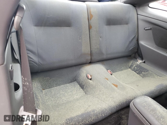 2000 Toyota Celica GT z VIN JTDDR32T2Y0052502, wystawiony jako Copart lot #74485804 z przebiegiem Nie podano mil oraz Nie do naprawy • Non repairable. Historia ofert i sprzedaży dostępna na DreamBid. Obrazek 10.