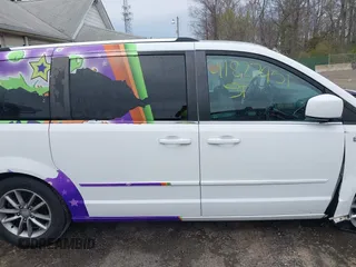 2014 Dodge Grand Caravan SXT with VIN 2C4RDGCG6ER361842, listed as a IAAI auction lot 41827951 with 100,845 mi miles and . Bid and sale history available at DreamBid. Image 13.