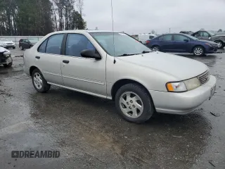 1996 Nissan Sentra XE z VIN 1N4AB41D2TC767557, wystawiony jako Copart lot #42553245 z przebiegiem 148 514 mil mil oraz Szkoda całkowita • Salvage title. Historia ofert i sprzedaży dostępna na DreamBid. Obrazek 4.