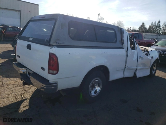 1999 Ford F-150 Work Series with VIN 1FTRX17W7XKA41548, listed as a Copart auction lot 88334145 with 0 mi miles and Salvage Title. Bid and sale history available at carsss.com. Image 3.