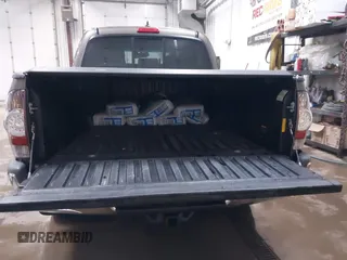 2014 Toyota Tacoma PreRunner with VIN 3TMJU4GNXEM164507, listed as a IAAI auction lot 42118984 with 183,101 mi miles and . Bid and sale history available at DreamBid. Image 18.