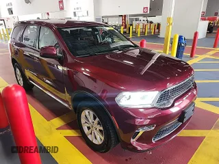 2021 Dodge Durango SXT Plus z VIN 1C4RDJAGXMC864510, wystawiony jako IAAI lot #42569697 z przebiegiem 90 206 mil mil oraz . Historia ofert i sprzedaży dostępna na DreamBid. Obrazek 1.