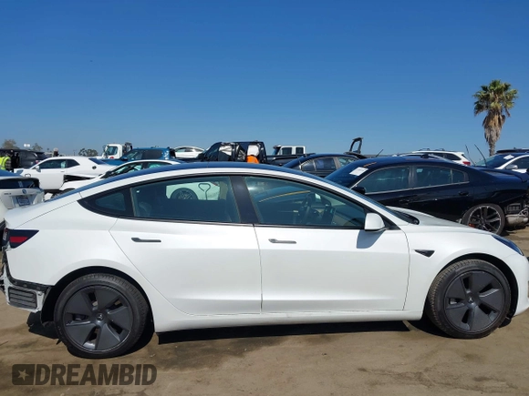 2023 Tesla Model 3 z VIN 5YJ3E1EA5PF401237, wystawiony jako IAAI lot #42520423 z przebiegiem 45 262 mil mil oraz . Historia ofert i sprzedaży dostępna na DreamBid. Obrazek 14.