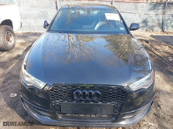 2014 Audi A6 3.0T Prestige with VIN WAUHGAFC8EN142187, listed as a IAAI auction lot 41833457 with 129,533 mi miles. Bid and sale history available at carsss.com. Image 6.