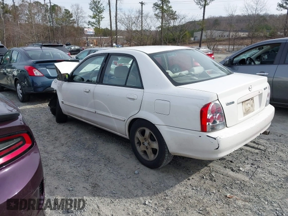 2000 Mazda Protege DX with VIN JM1BJ2221Y0208156, listed as a IAAI auction lot 41609657 with 435,304 mi miles and . Bid and sale history available at DreamBid. Image 3.