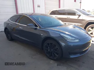 2018 Tesla Model 3 Long Range Battery with VIN 5YJ3E1EA7JF163401, listed as a IAAI auction lot 41829681 with 90,065 mi miles. Bid and sale history available at carsss.com. Image 12.