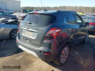 2018 Buick Encore Preferred with VIN KL4CJASB8JB619962, listed as a IAAI auction lot 41675481 with 157,033 mi miles. Bid and sale history available at carsss.com. Image 4.