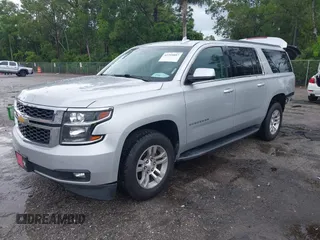 2016 Chevrolet Suburban LT z VIN 1GNSCHKCXGR111027, wystawiony jako IAAI lot #42399887 z przebiegiem 133 970 mil mil oraz . Historia ofert i sprzedaży dostępna na DreamBid. Obrazek 2.