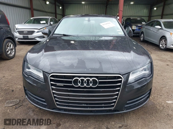 2015 Audi A7 3.0 TDI Premium Plus with VIN WAUWMAFC4FN034666, listed as a IAAI auction lot 41708296 with 101,744 mi miles. Bid and sale history available at carsss.com. Image 13.