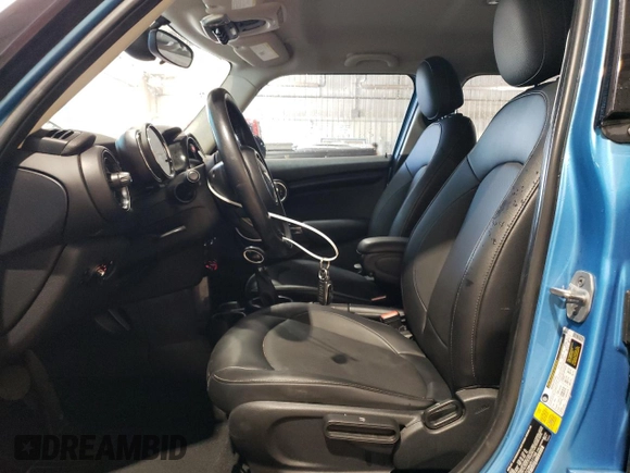 2017 MINI Hardtop 4 Door Cooper with VIN WMWXU1C58H2E17768, listed as a Copart auction lot 55128445 with 114,957 mi miles and Salvage Title. Bid and sale history available at DreamBid. Image 7.
