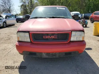 2000 GMC Sonoma SLS z VIN 1GTCS19W0Y8262960, wystawiony jako Copart lot #56512435 z przebiegiem 243 662 mil mil oraz Tytuł czysty. Historia ofert i sprzedaży dostępna na DreamBid. Obrazek 5.