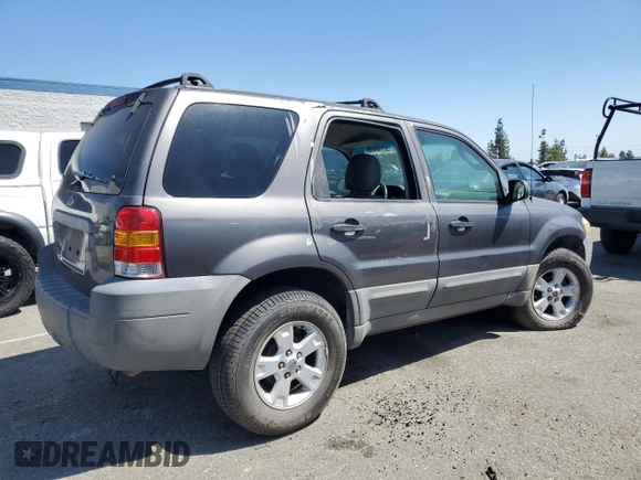 2005 Ford Escape XLT z VIN 1FMYU03155KB11291, wystawiony jako Copart lot #52246495 z przebiegiem Nie podano mil oraz Szkoda całkowita • Salvage title. Historia ofert i sprzedaży dostępna na DreamBid. Obrazek 3.