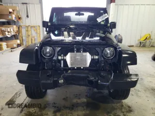 2013 Jeep Wrangler Rubicon with VIN 1C4BJWCG1DL584611, listed as a Copart auction lot 71536944 with 142,975 mi miles and Salvage title. Bid and sale history available at DreamBid. Image 5.