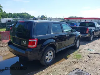 2011 Ford Escape XLS with VIN 1FMCU0C71BKA85329, listed as a IAAI auction lot 42774590 with 226,820 mi miles and . Bid and sale history available at DreamBid. Image 4.