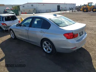 2013 BMW 3 Series 328i with VIN WBA3C1C52DF440786, listed as a IAAI auction lot 40777716 with 171,385 mi miles. Bid and sale history available at carsss.com. Image 3.