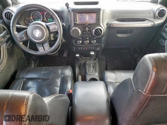 2012 Jeep Wrangler Unlimited Altitude with VIN 1C4HJWEGXCL180602, listed as a Copart auction lot 61391095 with 187,205 mi miles and Salvage title. Bid and sale history available at DreamBid. Image 8.