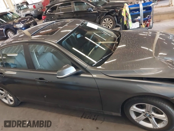 2015 BMW 3 Series 320i xDrive with VIN WBA3C3C5XFP664591, listed as a IAAI auction lot 42140108 with 81,064 mi miles and . Bid and sale history available at DreamBid. Image 13.