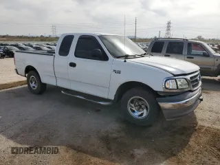 2003 Ford F-150 XL z VIN 1FTRX17233NB92067, wystawiony jako Copart lot #57986555 z przebiegiem 179 101 mil mil oraz Szkoda całkowita • Salvage title. Historia ofert i sprzedaży dostępna na DreamBid. Obrazek 4.