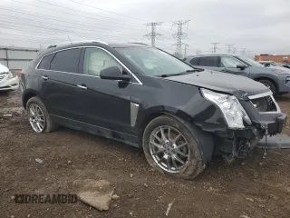 2014 Cadillac SRX Luxury Collection z VIN 3GYFNEE34ES685593, wystawiony jako Copart lot #52202805 z przebiegiem 139 869 mil mil oraz Szkoda całkowita • Salvage title. Historia ofert i sprzedaży dostępna na DreamBid. Obrazek 4.