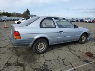 1996 Toyota Tercel DX z VIN JT2AC52L2T0137695, wystawiony jako Copart lot #86535844 z przebiegiem 246 554 mil mil oraz Czysty tytuł • Clean title. Historia ofert i sprzedaży dostępna na DreamBid. Obrazek 3.