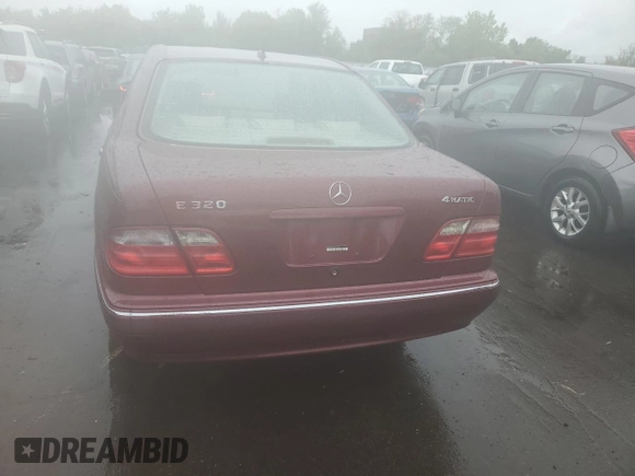 2002 Mercedes-Benz E 320 with VIN WDBJF82J22X070566, listed as a Copart auction lot 55964535 with 238,240 mi miles and Salvage Title. Bid and sale history available at DreamBid. Image 6.