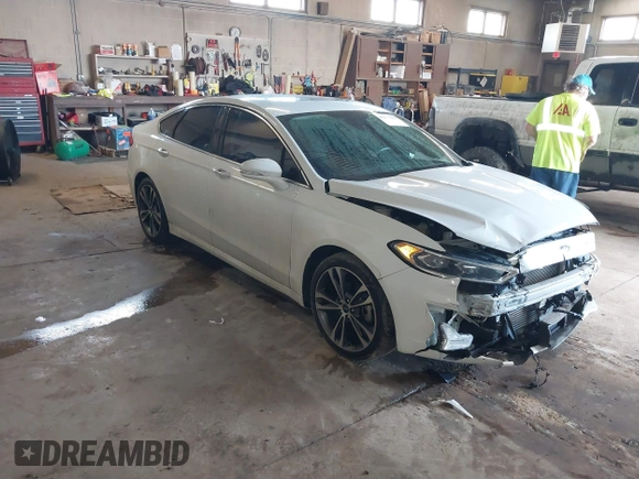 2019 Ford Fusion Titanium with VIN 3FA6P0D92KR153096, listed as a IAAI auction lot 41679393 with 127,292 mi miles and . Bid and sale history available at DreamBid. Image 1.