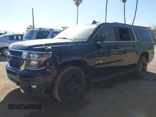 2020 Chevrolet Suburban LT with VIN 1GNSKHKC5LR303081, listed as a IAAI auction lot 41896511 with 60,121 mi miles and . Bid and sale history available at DreamBid. Image 16.