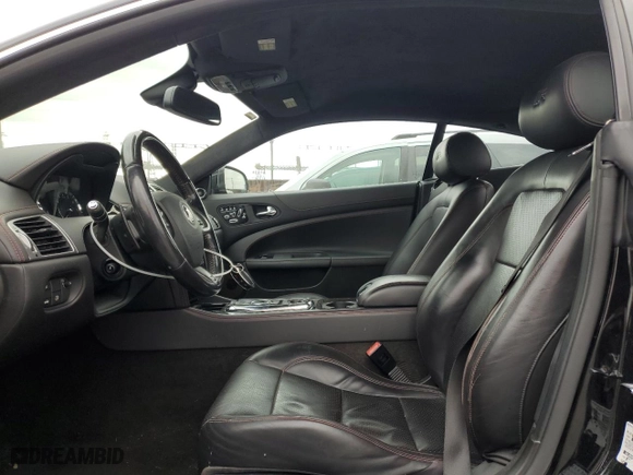 2013 Jaguar XK with VIN SAJWA4DC6DMB50779, listed as a Copart auction lot 50687705 with 106,826 mi miles and Clean Title. Bid and sale history available at carsss.com. Image 7.