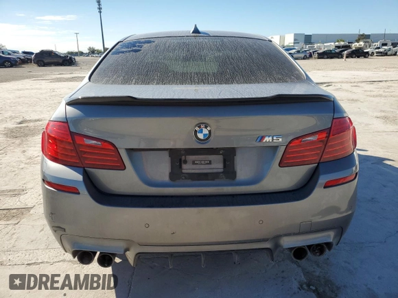 2014 BMW M5 with VIN WBSFV9C52ED097797, listed as a Copart auction lot 81085504 with 83,990 mi miles and Salvage Title. Bid and sale history available at carsss.com. Image 6.