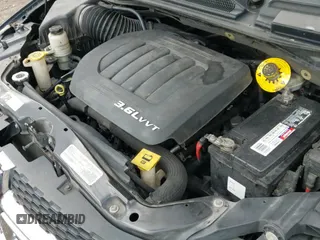 2016 Dodge Grand Caravan SXT z VIN 2C4RDGCG9GR151903, wystawiony jako IAAI lot #43411389 z przebiegiem 225 359 mil mil oraz . Historia ofert i sprzedaży dostępna na DreamBid. Obrazek 19.