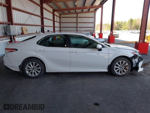 2020 Toyota Camry LE with VIN 4T1C11AK9LU935025, listed as a IAAI auction lot 42054033 with 63,814 mi miles and . Bid and sale history available at carsss.com. Image 13.