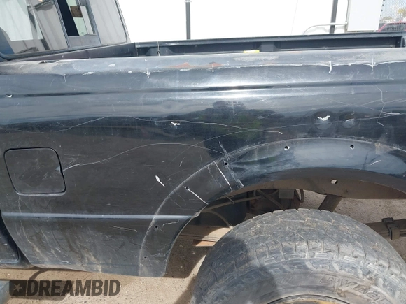 2003 Ford Ranger XL Fleet z VIN 1FTZR45E33PB11145, wystawiony jako IAAI lot #42643295 z przebiegiem Nie podano mil oraz . Historia ofert i sprzedaży dostępna na DreamBid. Obrazek 11.