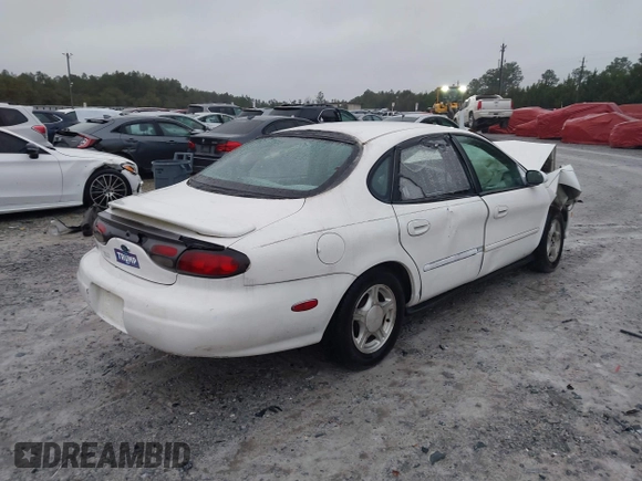 1999 Ford Taurus SE with VIN 1FAFP53S4XA185115, listed as a IAAI auction lot 41263216 with 182,770 mi miles. Bid and sale history available at carsss.com. Image 4.