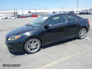 2007 Scion tC Spec with VIN JTKDE177370167757, listed as a IAAI auction lot 42011334 with 147,383 mi miles. Bid and sale history available at carsss.com. Image 2.