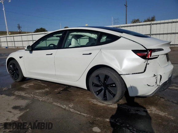 2025 Tesla Model 3 Long Range with VIN 5YJ3E1EAXSF935004, listed as a Copart auction lot 52233195 with 5,873 mi miles and Salvage Title. Bid and sale history available at carsss.com. Image 2.