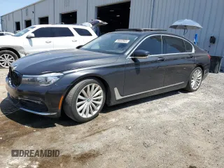 2017 BMW 7 Series 740i z VIN WBA7E2C30HG741105, wystawiony jako Copart lot #56632005 z przebiegiem 95 162 mil mil oraz Czysty tytuł • Clean title. Historia ofert i sprzedaży dostępna na DreamBid. Obrazek 1.