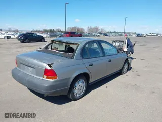 1999 Saturn SL with VIN 1G8ZH5282XZ169243, listed as a IAAI auction lot 41859519 with 224,157 mi miles. Bid and sale history available at carsss.com. Image 4.