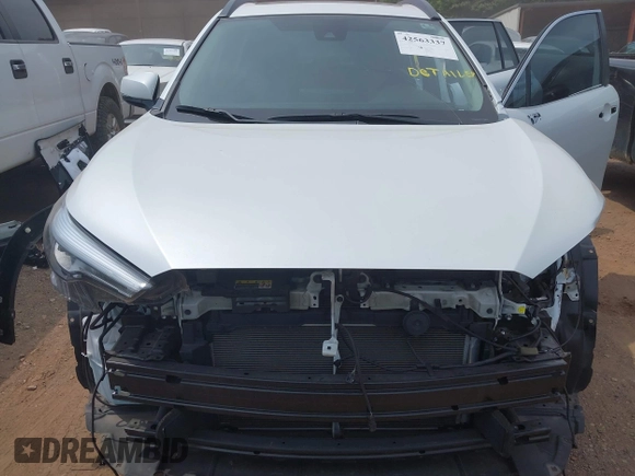 2022 Toyota Corolla Cross XLE with VIN 7MUDAABG0NV027076, listed as a IAAI auction lot 42563337 with 46,375 mi miles and . Bid and sale history available at DreamBid. Image 6.
