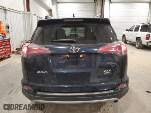 2018 Toyota RAV4 XLE with VIN JTMRFREV2JD254334, listed as a Copart auction lot 53079335 with 27,717 mi miles and Clean Title. Bid and sale history available at DreamBid. Image 6.