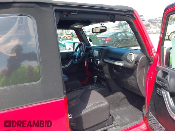 2014 Jeep Wrangler Sahara with VIN 1C4AJWBG0EL109773, listed as a IAAI auction lot 41678412 with 12,264 mi miles and . Bid and sale history available at DreamBid. Image 5.