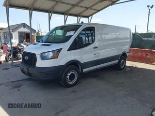 2021 Ford Transit Cargo z VIN 1FTBR1Y89MKA66720, wystawiony jako IAAI lot #42064777 z przebiegiem 112 171 mil mil oraz . Historia ofert i sprzedaży dostępna na DreamBid. Obrazek 18.