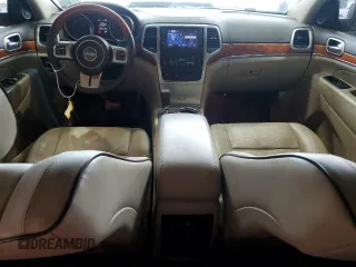 2013 Jeep Grand Cherokee Overland with VIN 1C4RJECT6DC526032, listed as a Copart auction lot 55660905 with 97,406 mi miles and Salvage Title. Bid and sale history available at DreamBid. Image 8.