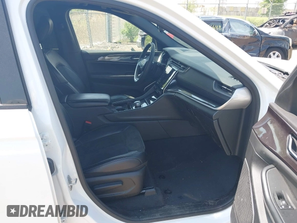 2023 Jeep Grand Cherokee Altitude with VIN 1C4RJHAG4P8106056, listed as a IAAI auction lot 42275021 with 27,251 mi miles and . Bid and sale history available at DreamBid. Image 5.