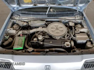 1984 Honda Civic z VIN JHMAH3321ES036981, wystawiony jako Copart lot #55697265 z przebiegiem Nie podano mil oraz Tytuł czysty. Historia ofert i sprzedaży dostępna na DreamBid. Obrazek 11.