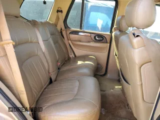 2003 GMC Envoy SLT z VIN 1GKDS13S032134647, wystawiony jako Copart lot #50137325 z przebiegiem 217 878 mil mil oraz Szkody całkowita. Historia ofert i sprzedaży dostępna na DreamBid. Obrazek 10.