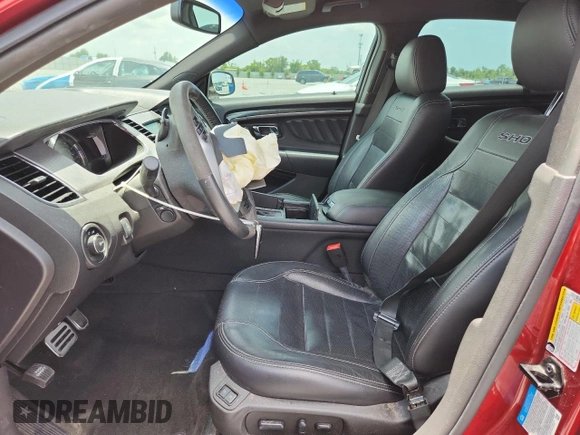 2015 Ford Taurus SHO with VIN 1FAHP2KTXFG130133, listed as a Copart auction lot 60019955 with 92,527 mi miles and Salvage title. Bid and sale history available at DreamBid. Image 7.